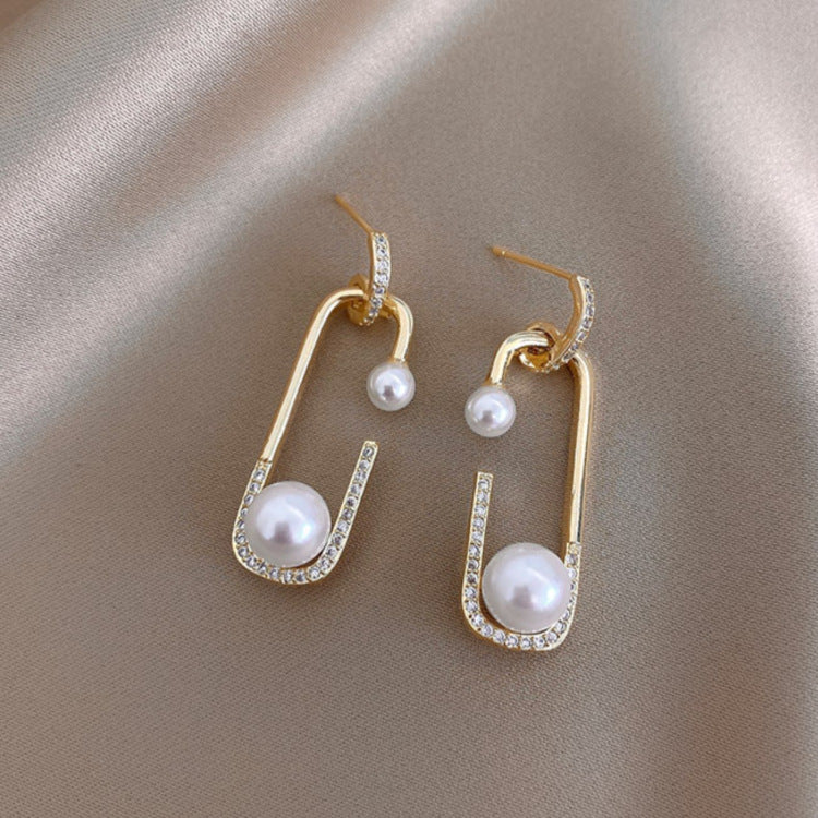 Stud JOLYA Earrings With Diamond.